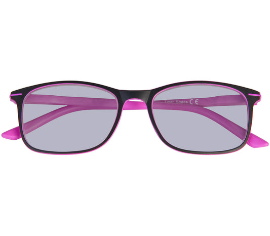 Female model wearing Mirage (Pink) classic shaped reading sunglasses with two tone black and pink frames with smoke grey lenses.