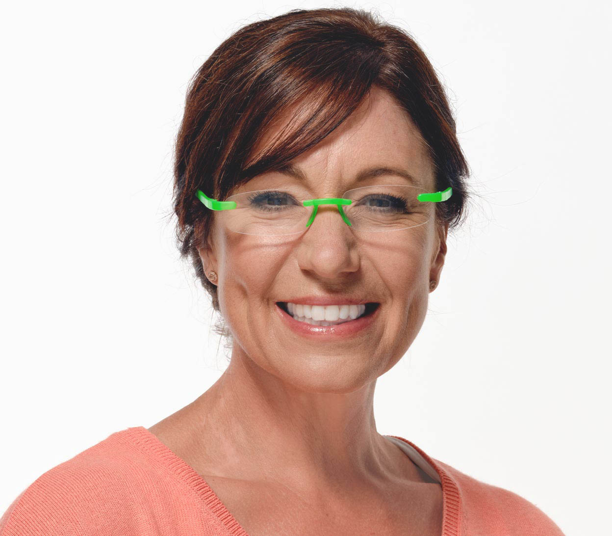 Female model wearing Jelli Neon (Green) rimless, slim reading glasses with semi-translucent bright green arms and bridge.