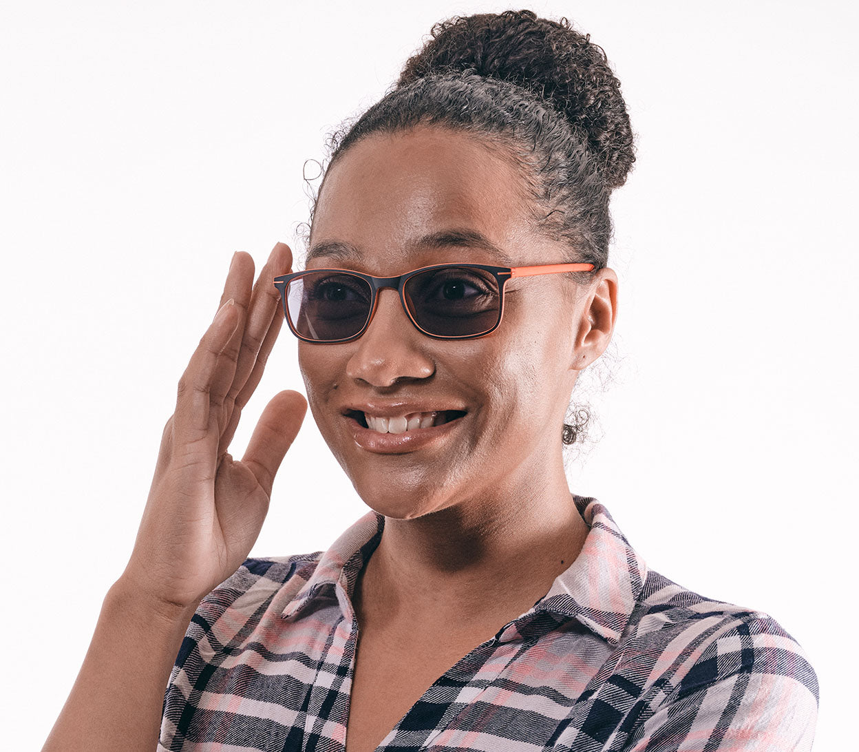 Female model wearing Esprit (Orange) sunglasses with two tone orange and black frames and temples. Classic shaped lenses with a smoke grey tint.