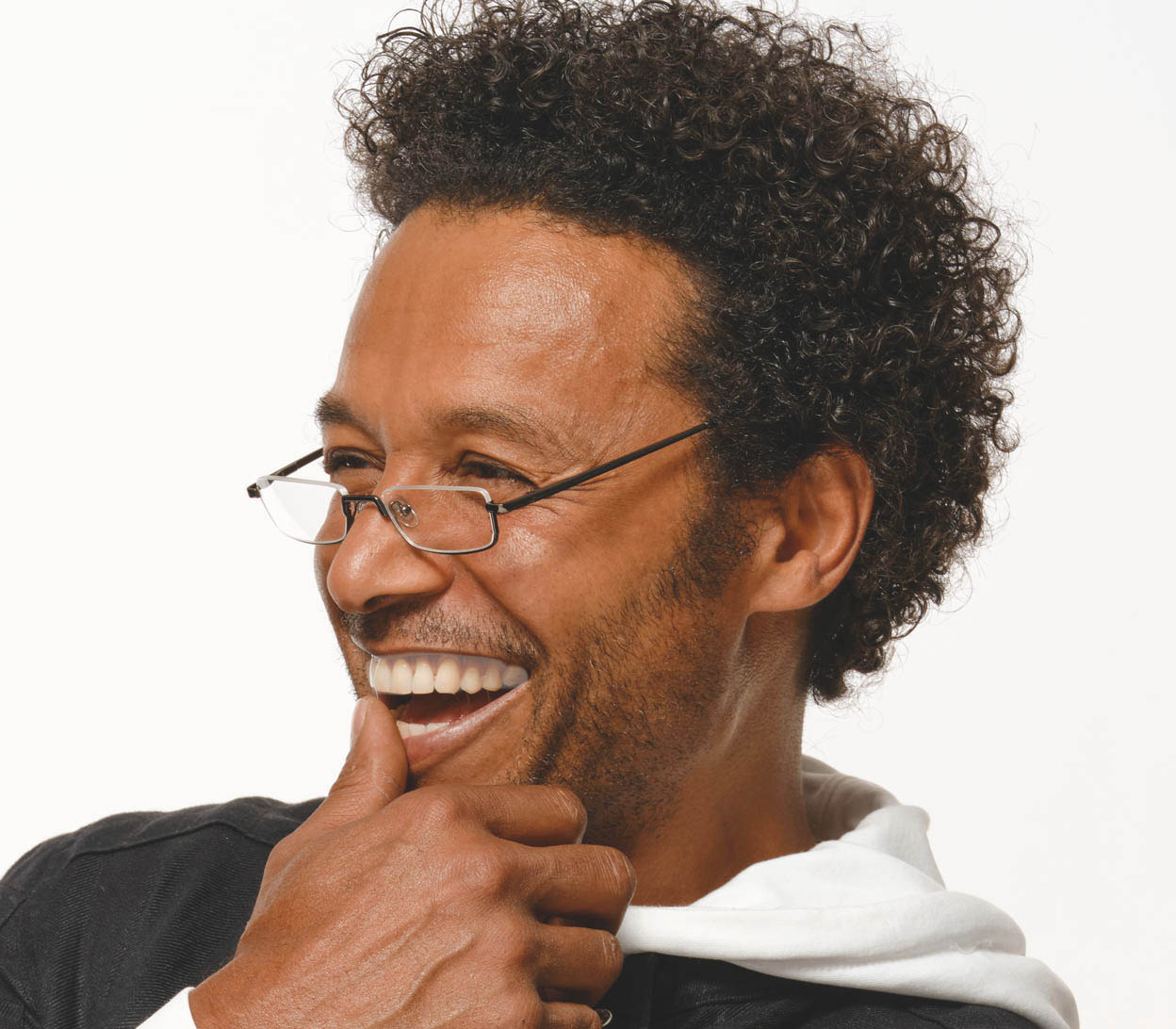 Male model wearing Mayfair (Gunmetal) semi rimless, slim unisex reading galsses with small rectangular lenses and a gunmetal finish.