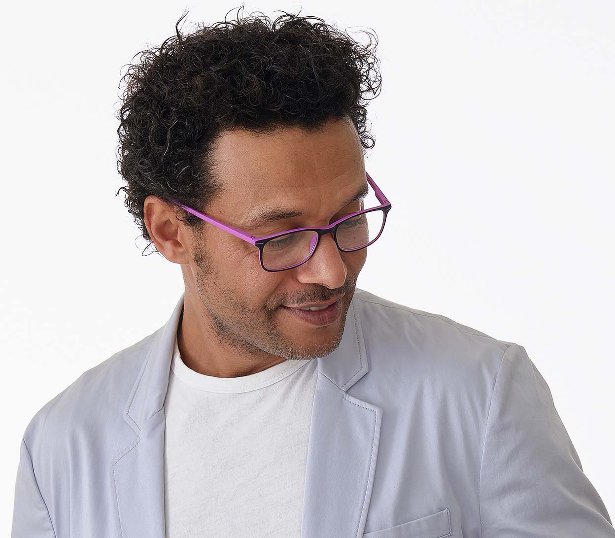 Male model wearing Jazz (Pink) classic shape reading glasses with rectangular lenses in a two tone pink and black frame.