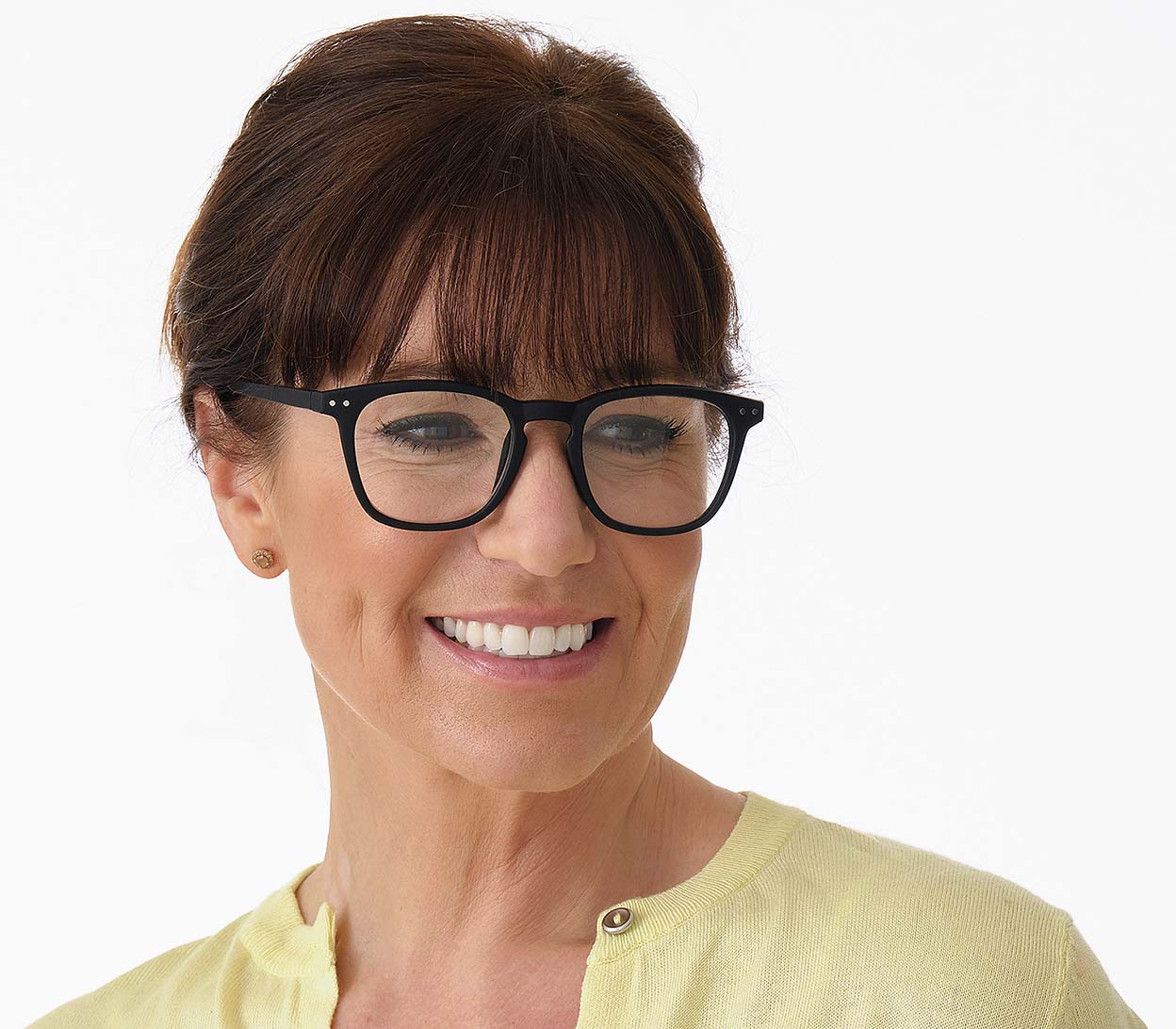 Female model wearing Scholar (Black) retro unisex reading glasses with large oval shaped lenses, slender black frames and rivet details.