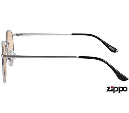 Tresco (Silver) Brushed silver round sunglasses with a slender metal frame and brown tinted lenses. Side view.