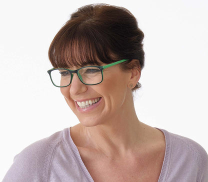 Female model wearing Jazz (Green) classic shape reading glasses with rectangular lenses in a two tone green and black frame.
