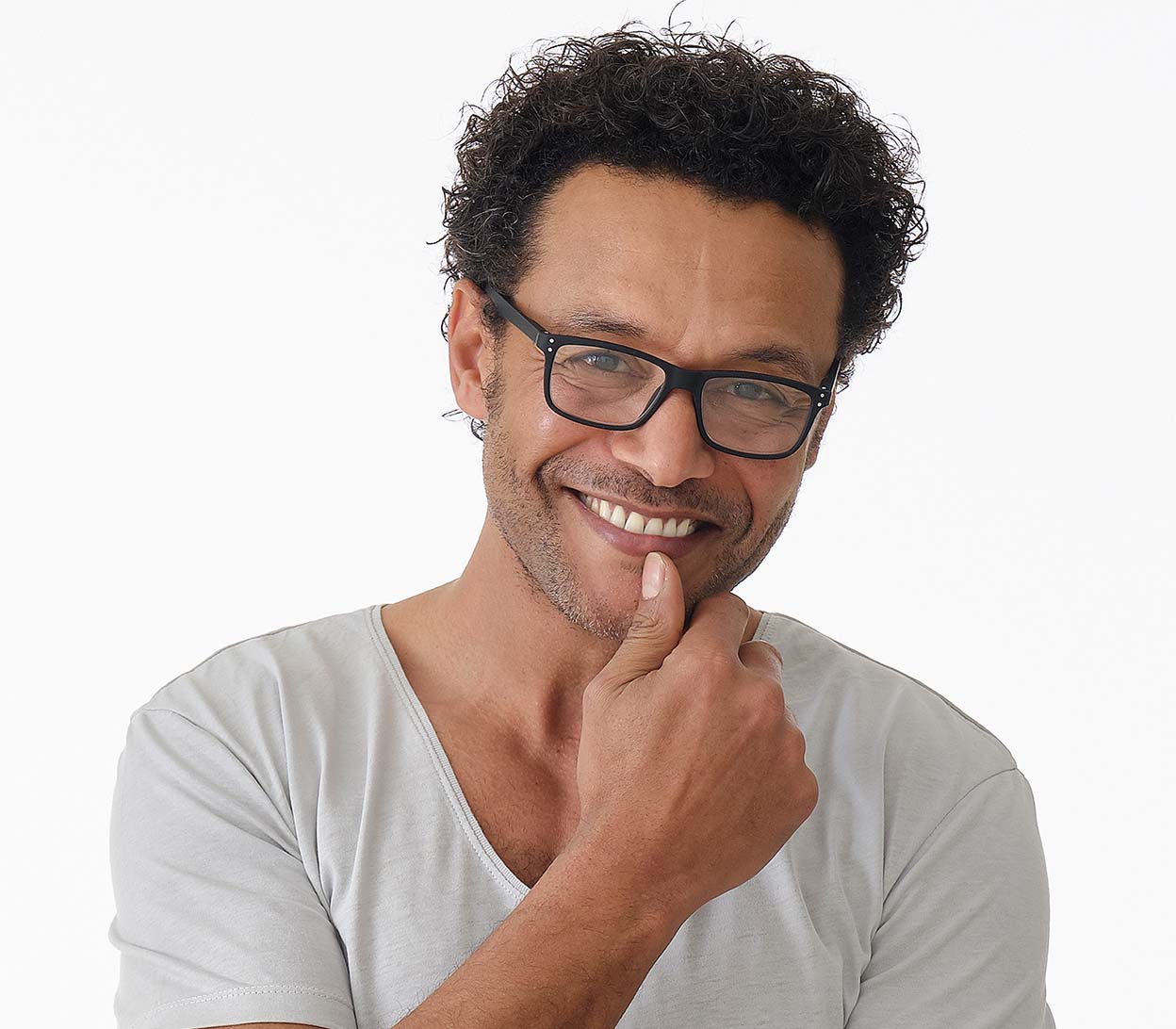 Male model wearing Dexter (Black) classic shape unisex reading glasses with a soft touch matt black frame.