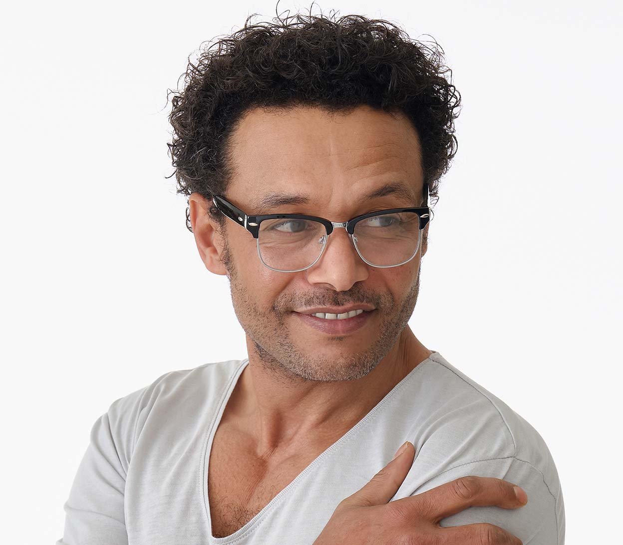 Male model wearing Harvard (Black) classic unisex clubmaster reading glasses with metal frame details and glossy black temples.