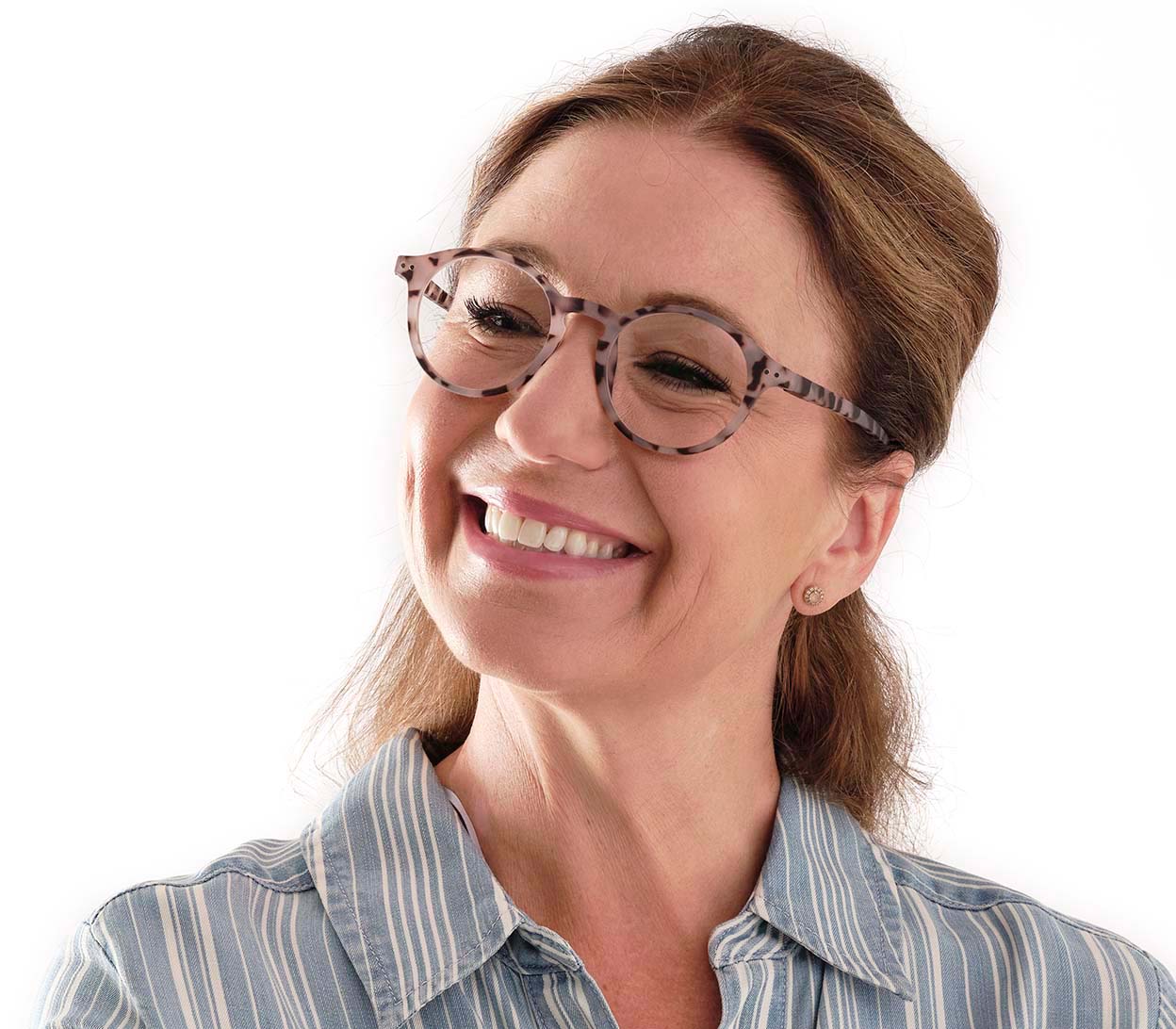 Female model wearing Oskar (Grey Tortoise) unisex reading glasses with large round lenses and grey tortoiseshell frames.