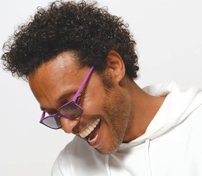 Mirage (Pink) classic shaped reading sunglasses with two tone black and pink frames with smoke grey lenses. Side view.