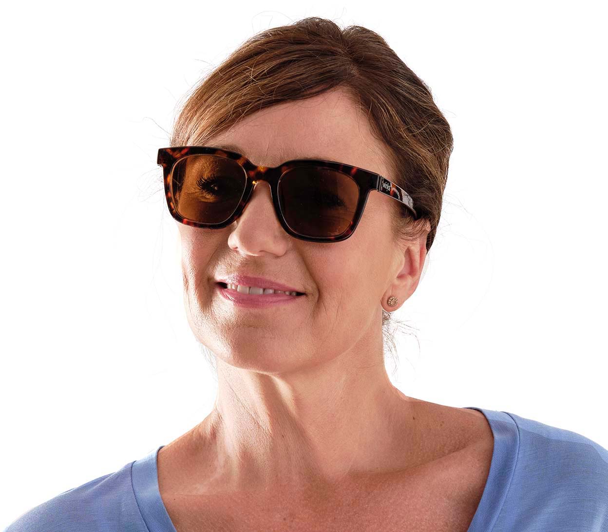 Female model wearing Roma (Tortoiseshell) oversized unisex sunglasses. Tortoiseshell frame and large brown tinted lenses.