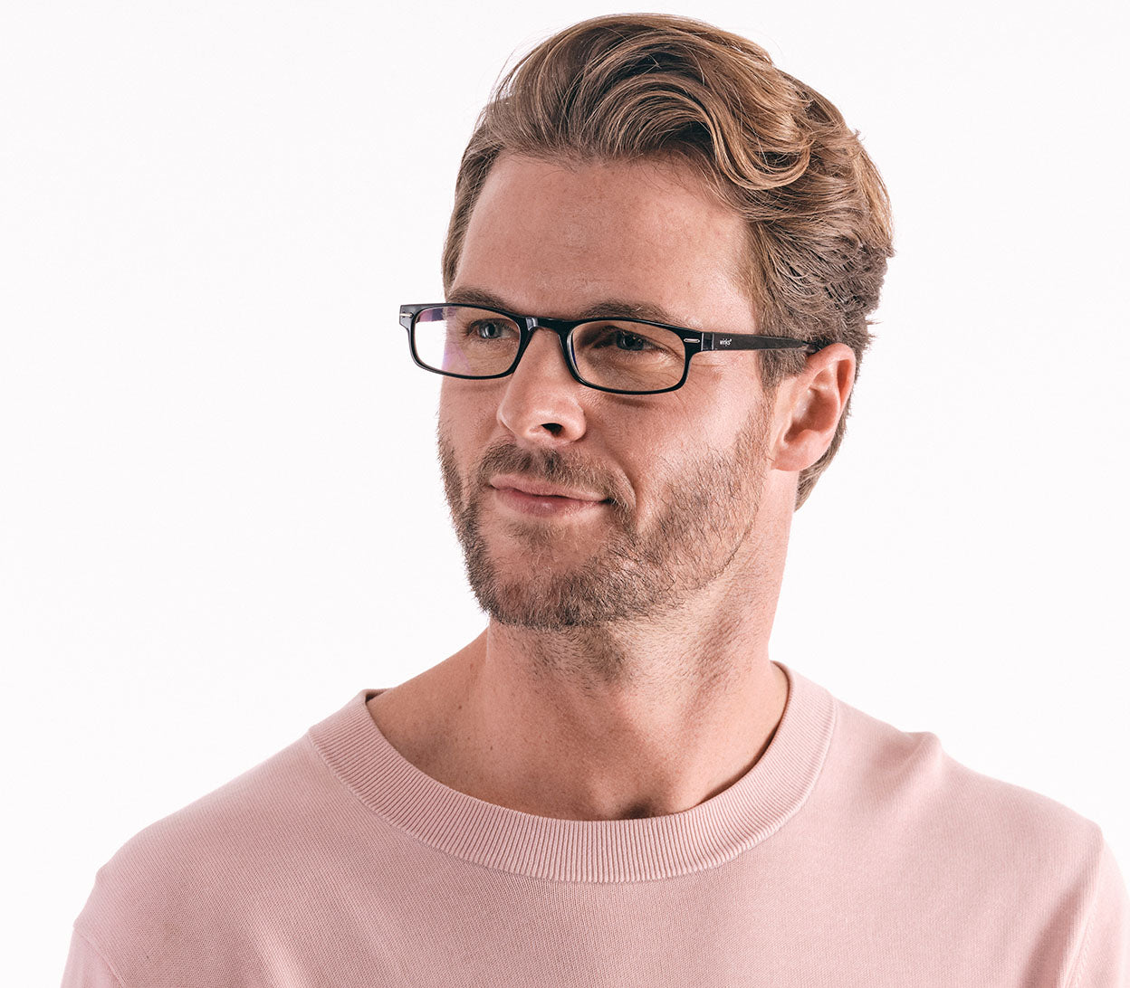 Male model wearing London Digital (Black) classic rectangular and slim unisex blue light reading glasses in a glossy black finish.