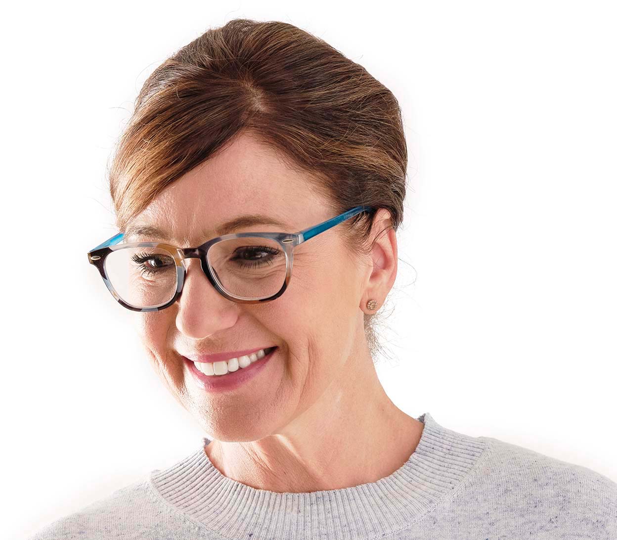 Female model wearing unisex reading glasses, retro shape with large oval lenses and blue, multicoloured pattern.