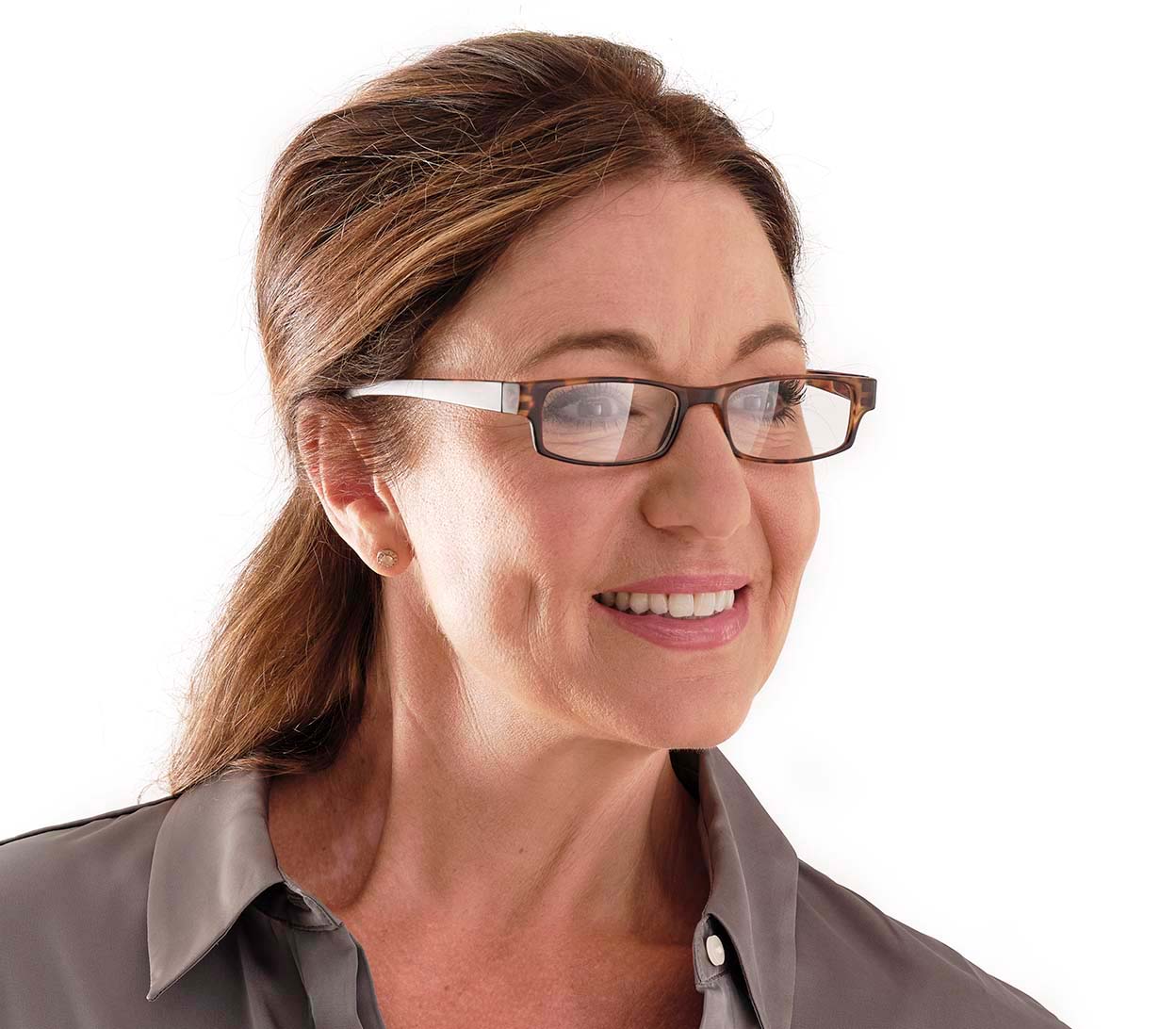 Female model wearing Magic (Tortoiseshell) classic slim unisex reading glasses in a matt tortoiseshell finish.