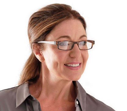 Female model wearing Magic (Tortoiseshell) classic slim unisex reading glasses in a matt tortoiseshell finish.
