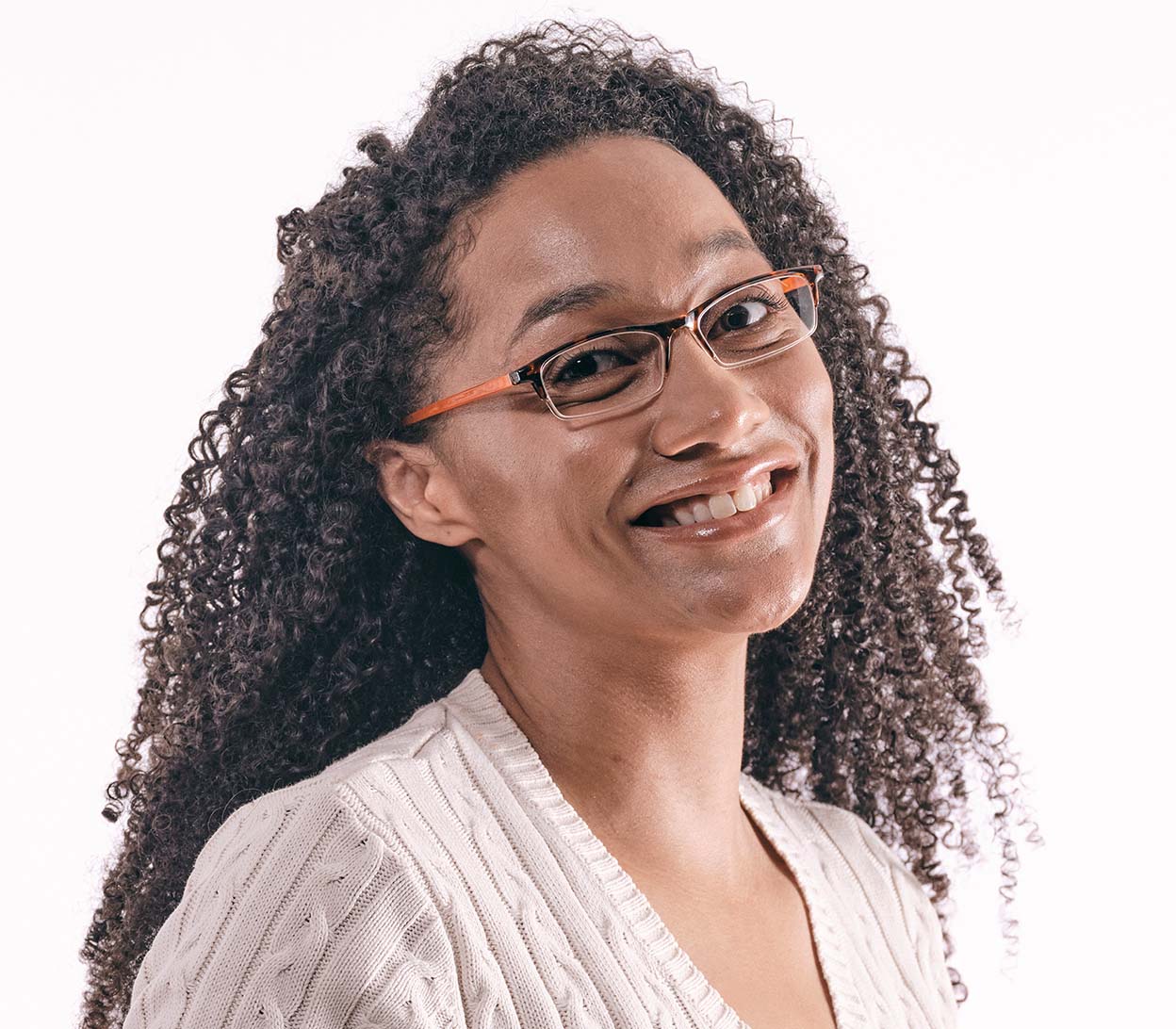 Female model wearing Yoyo (Orange) semi-rimless classic two tone reading glasses. With a tortoiseshell frame and orange temples.