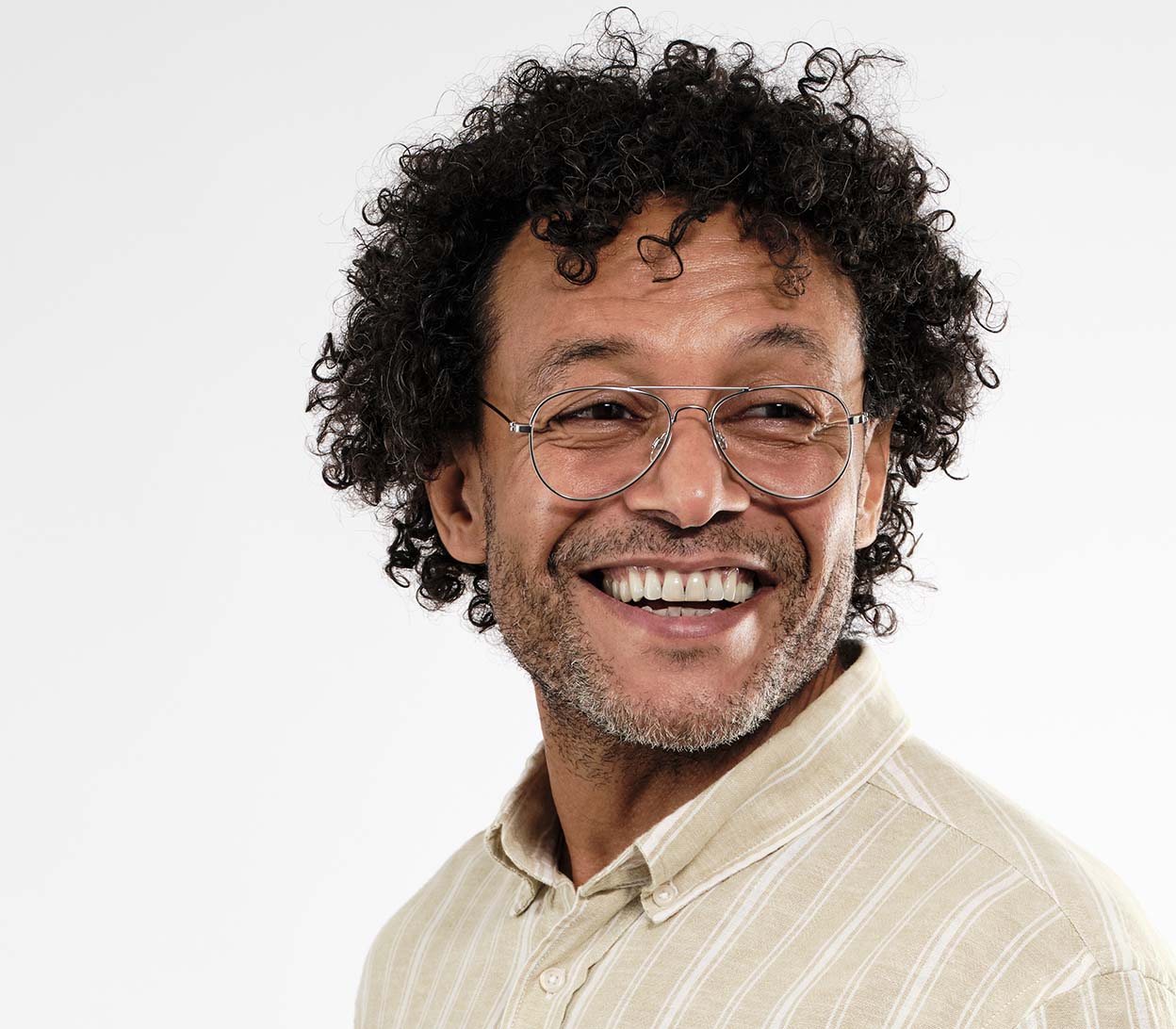 Male model wearing Mateo (Silver) classic aviator shaped reading glasses with a slim silver frame and oversized lenses.