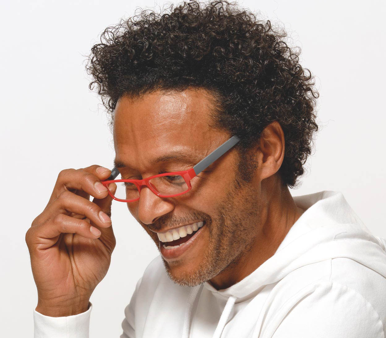 Male model wearing Magic (Red) classic slim unisex reading glasses in a glossy red and grey finish.