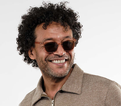 Pisa (Clear) large, oversized retro style, bifocal reading sunglasses. Clear frame and tinted smoke grey lenses. Front view.