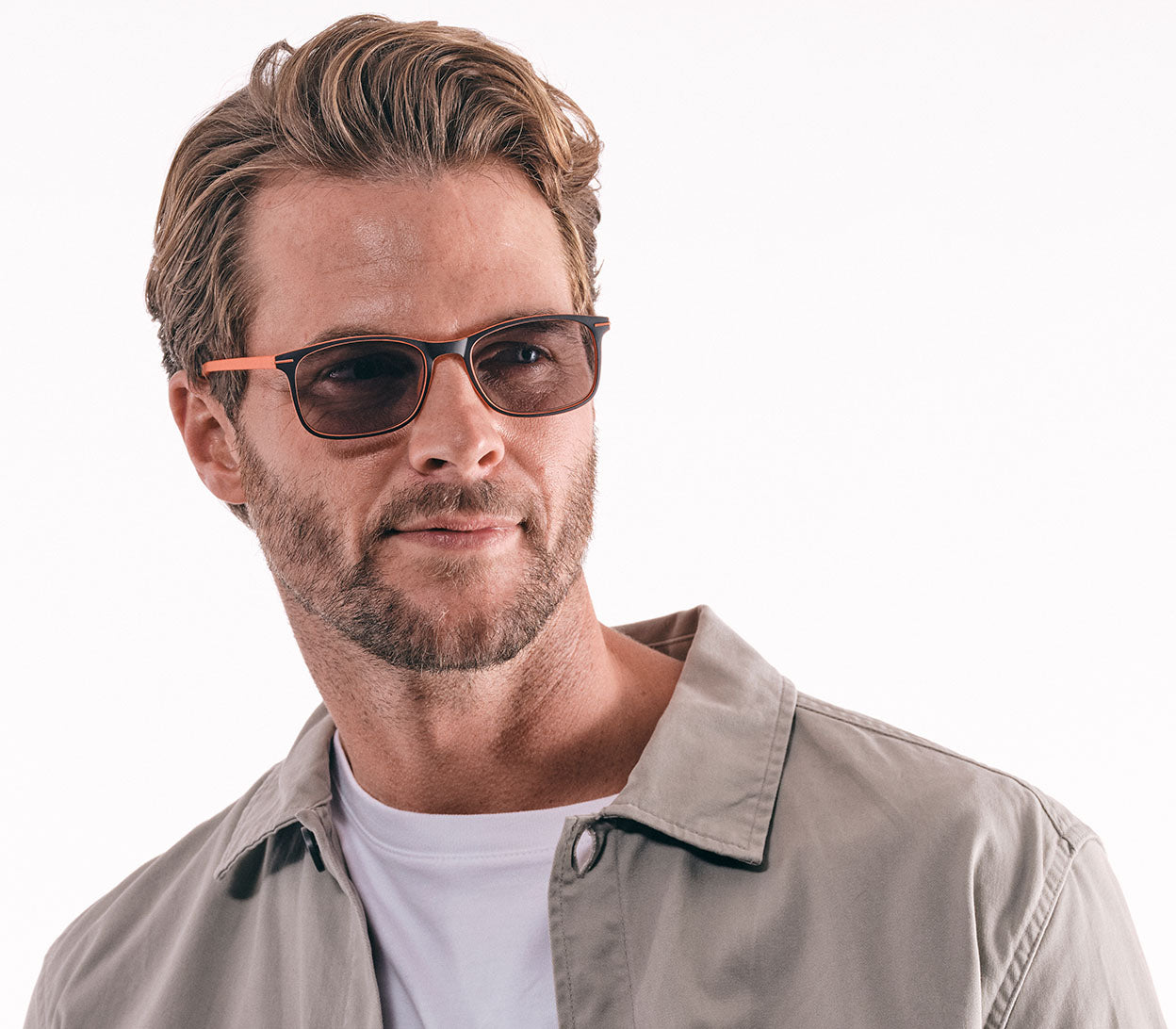 Mirage (Orange) classic shaped reading sunglasses with two tone black and orange frames with smoke grey lenses. Side view.