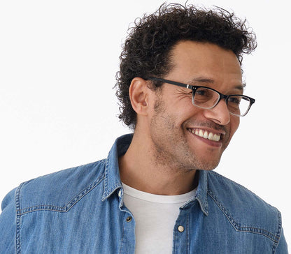 Male model wearing Penguin (Black) classic vintage style, unisex reading glasses with a two tone black and clear frame.