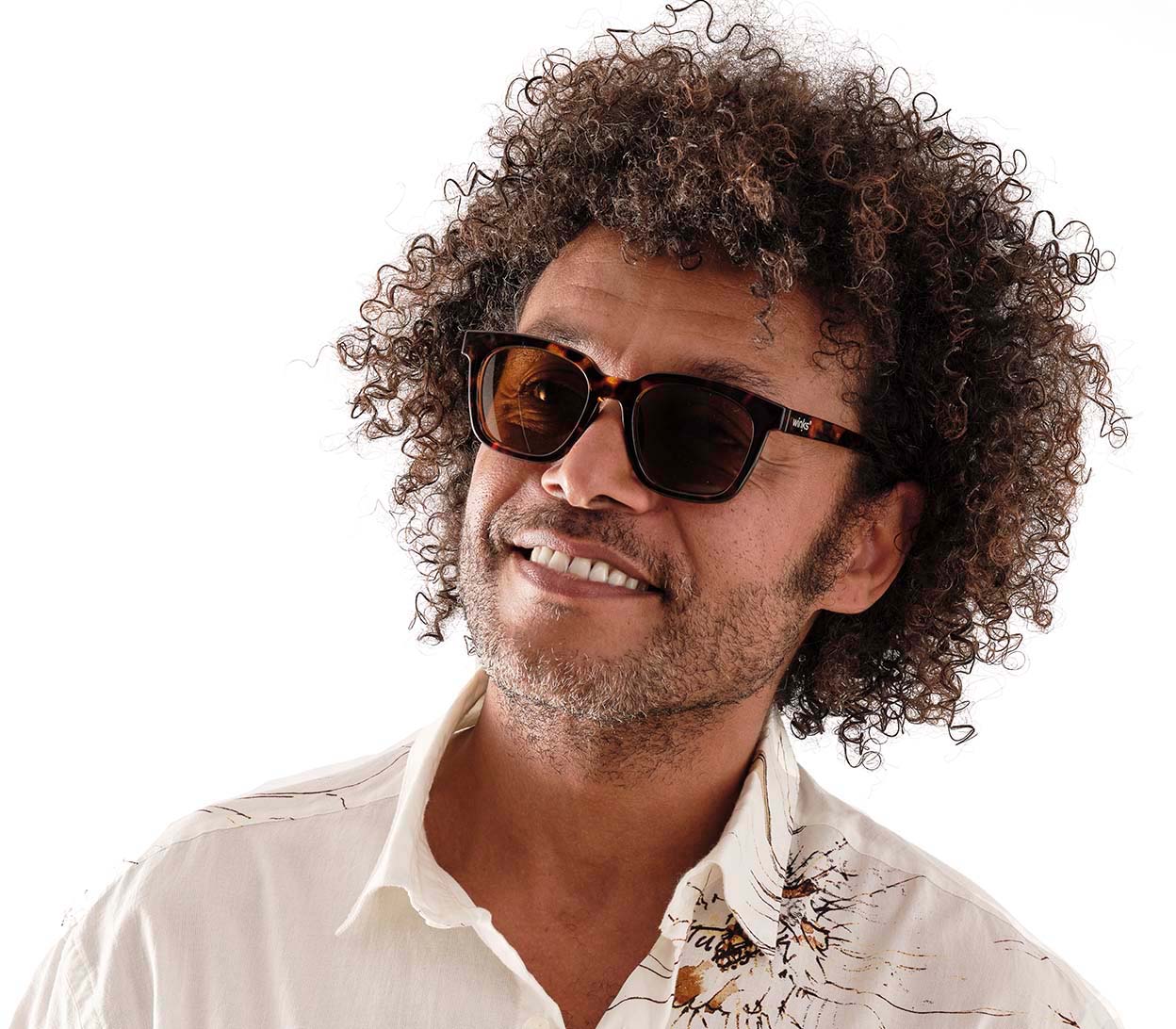 Male model wearing Roma (Tortoiseshell) oversized unisex sunglasses. Tortoiseshell frame and large brown tinted lenses.