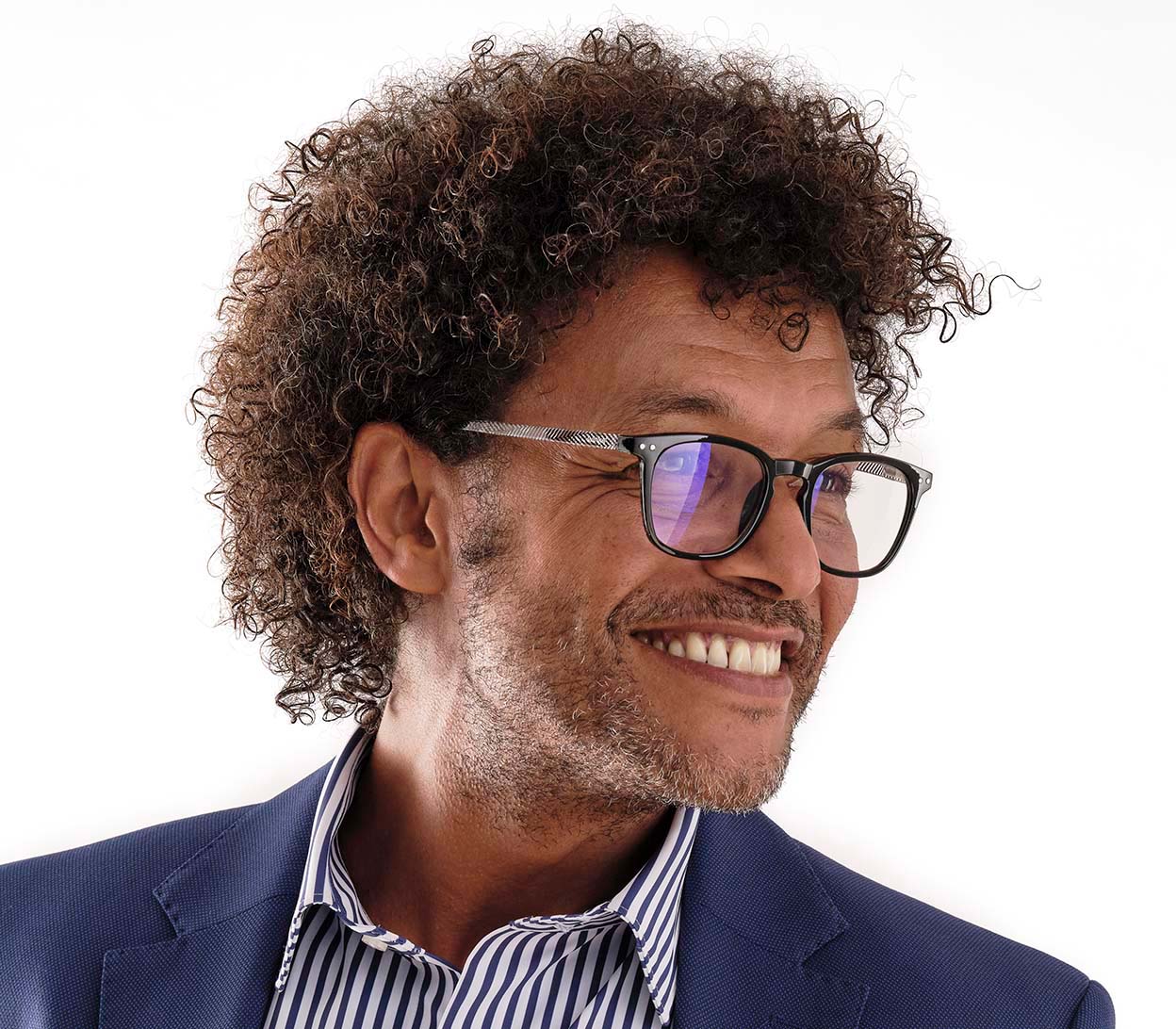 Male model wearing Helix (Black) retro shaped blue light reading glasses with black frames and chevron patterned arms.