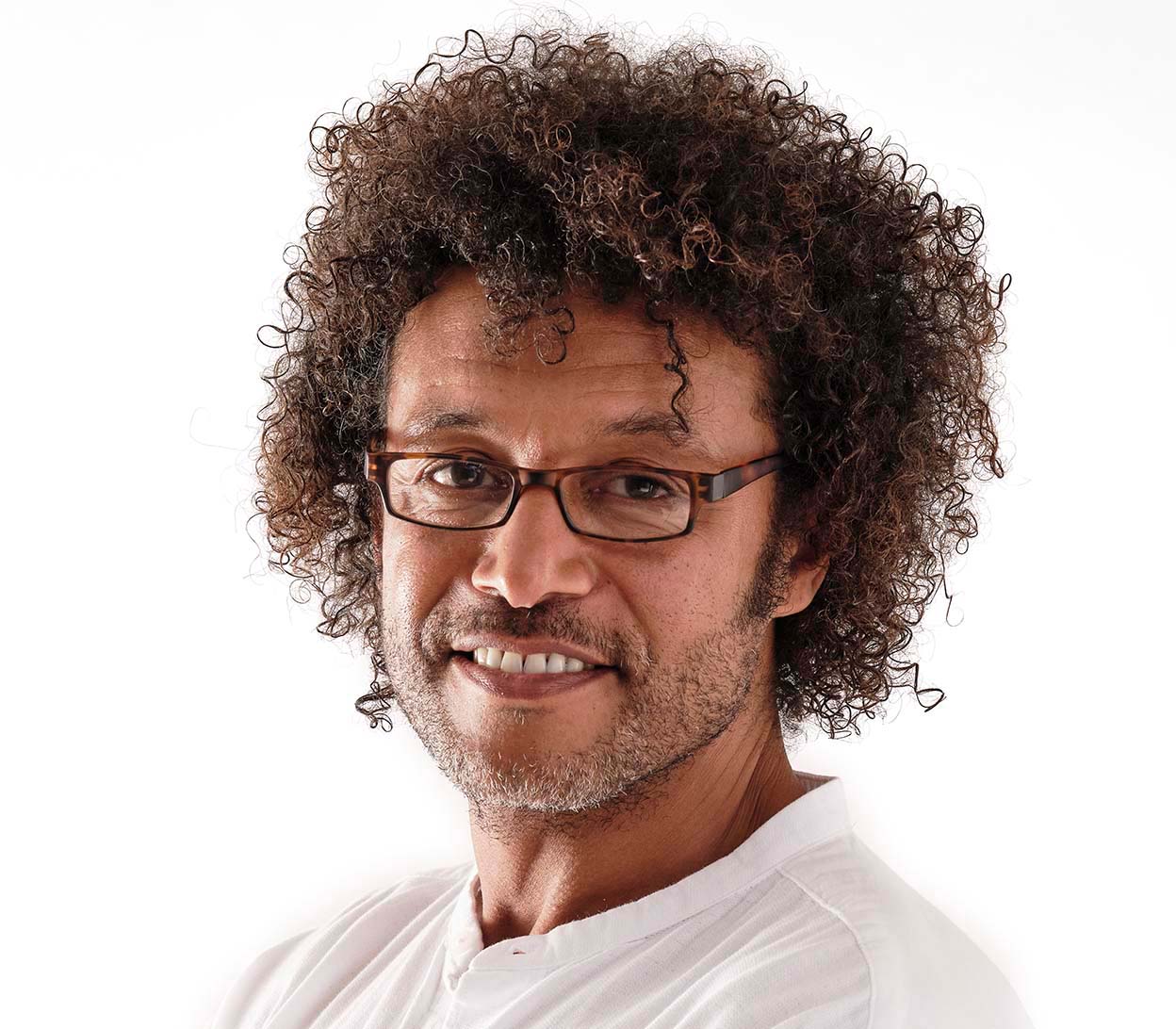 Male model wearing Magic (Tortoiseshell) classic slim unisex reading glasses in a matt tortoiseshell finish.