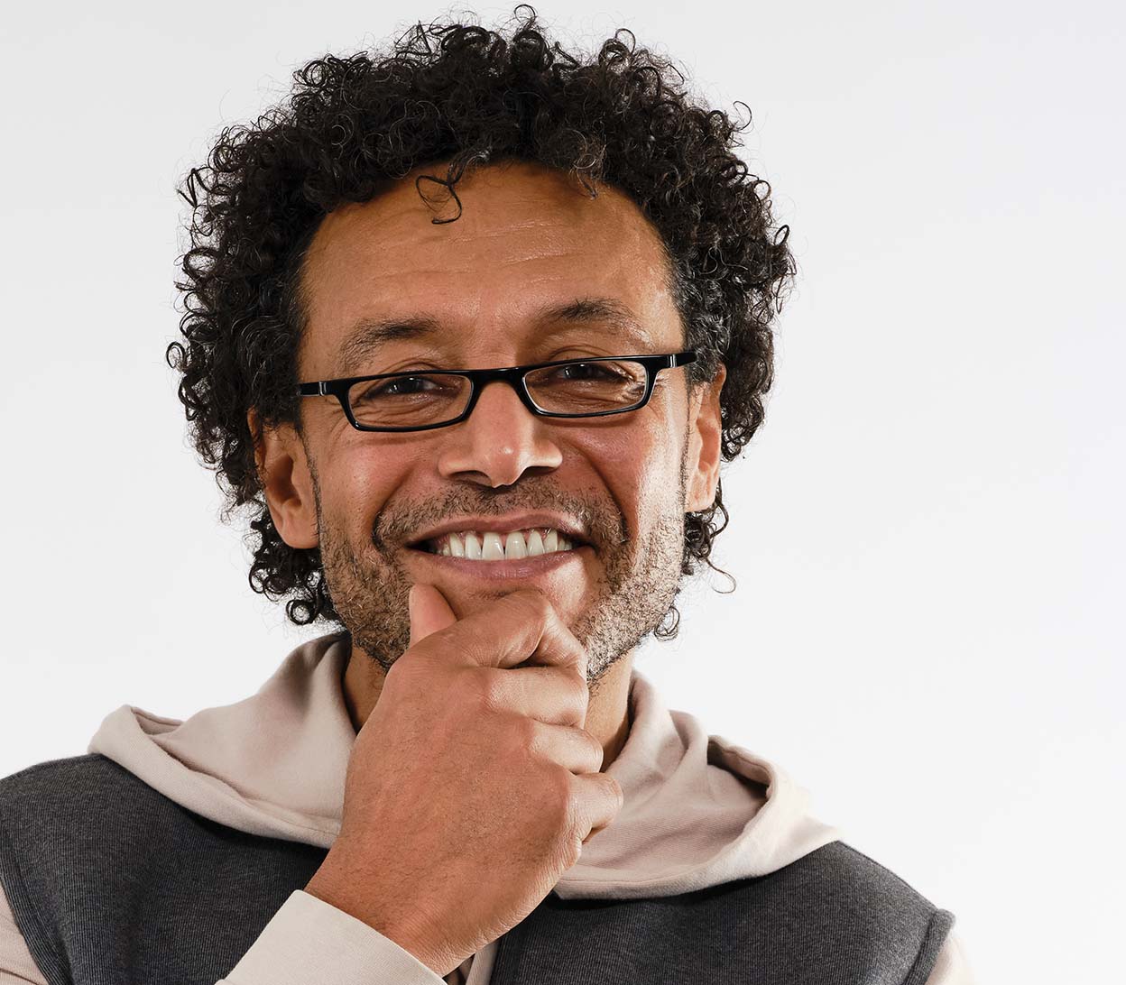 Male model wearing Mylo (Black) classic shape, slim reading glasses with black glossy frame.