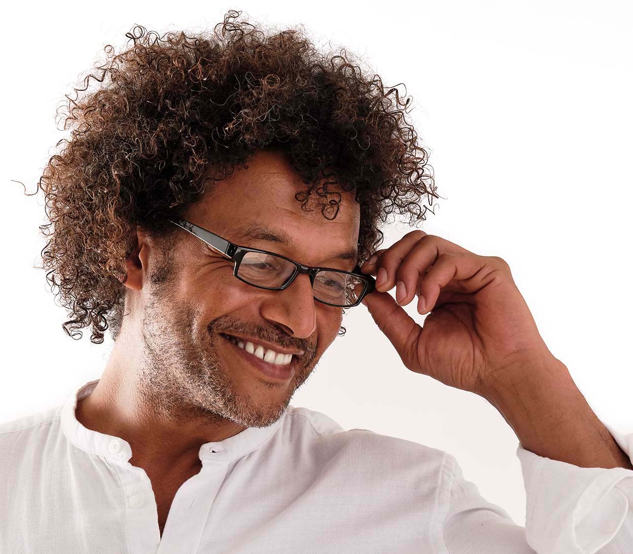 Male model wearing Magic (Black) classic slim unisex glasses in a glossy black finish.