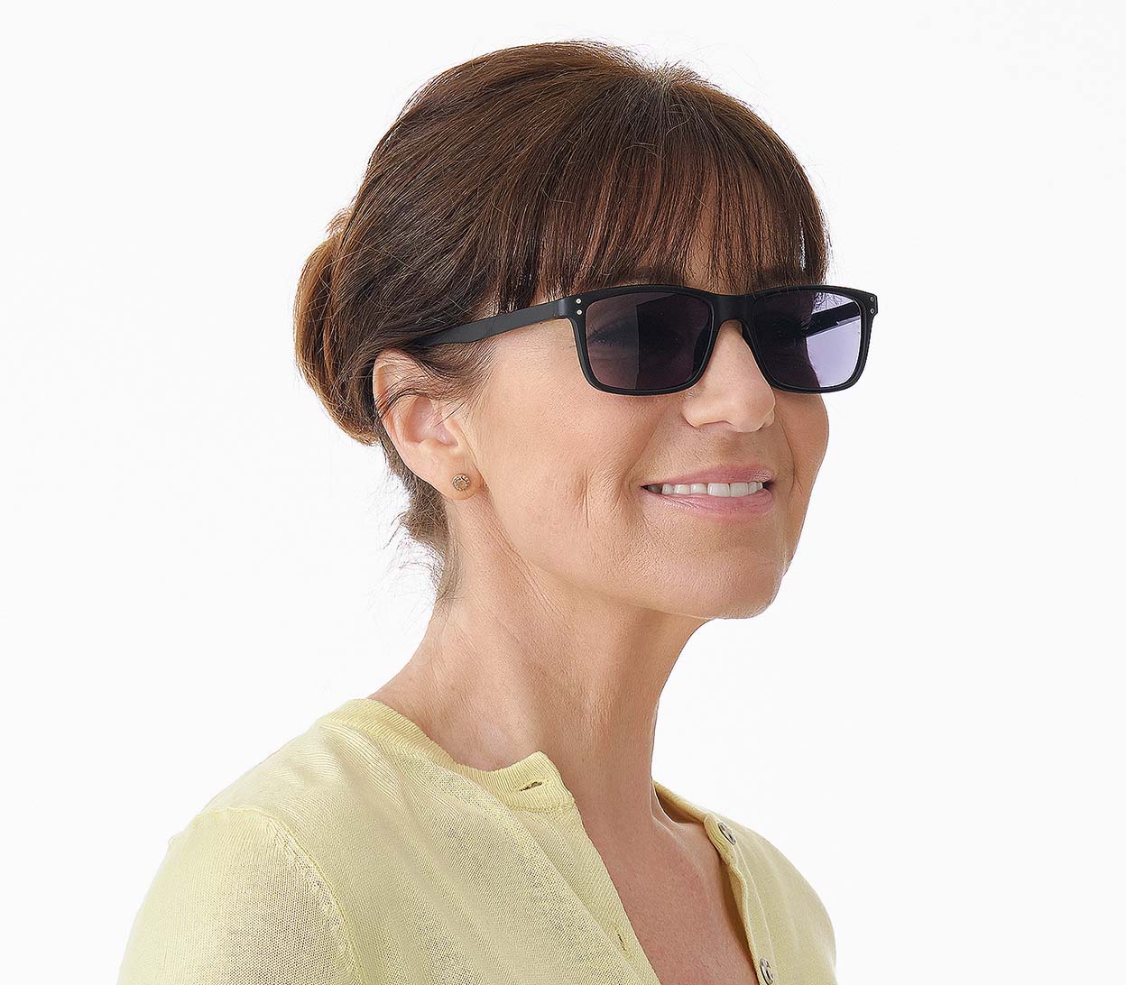 Female model wearing Lucca (Black) classic unisex reading glasses with a matt black frame and grey tinted lenses.