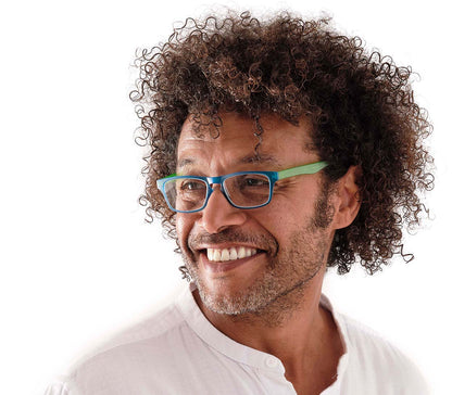 Male model wearing Metro (Blue) classic unisex reading glasses with oval lenses in a two tone blue and green frame.