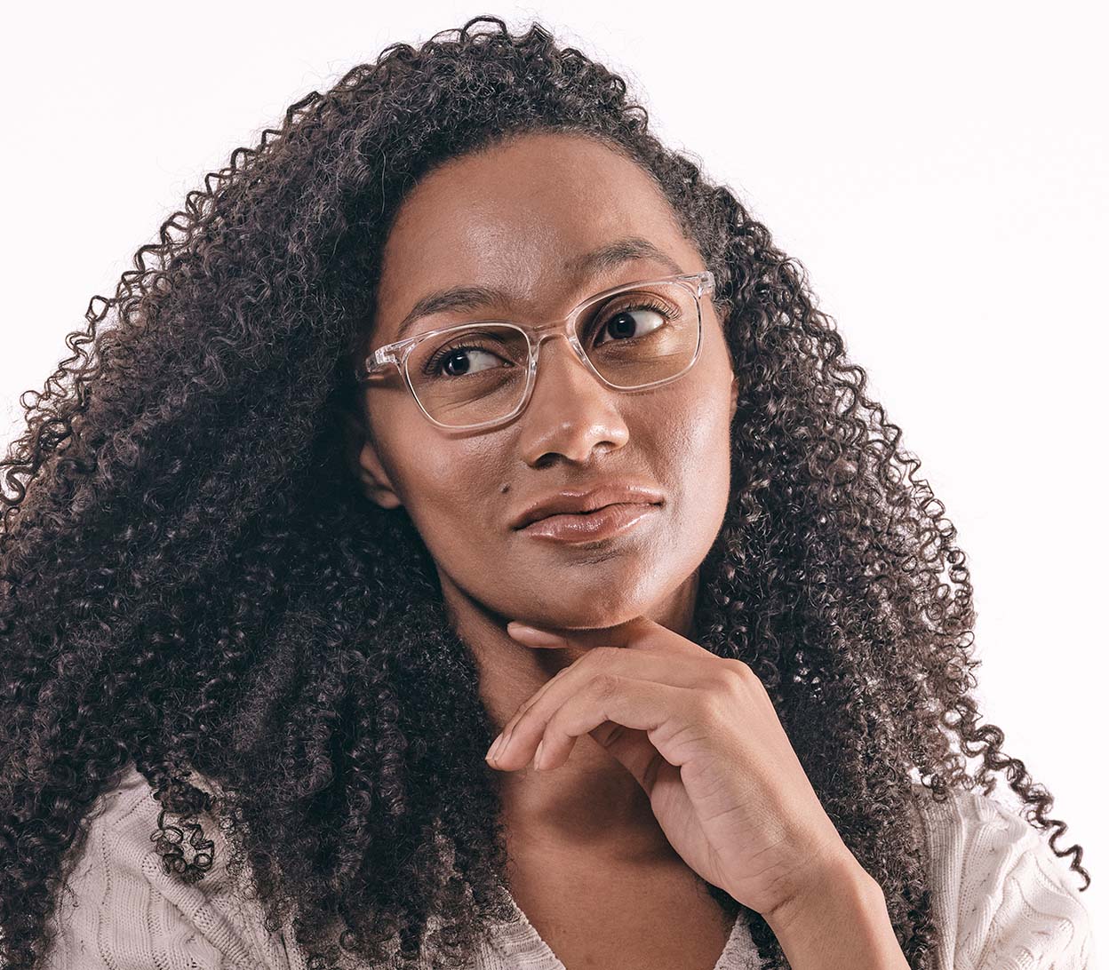 Female model wearing Artist Digital (Clear) unisex reading glasses with specialist blue light lenses. Clear frames and large oval lenses.