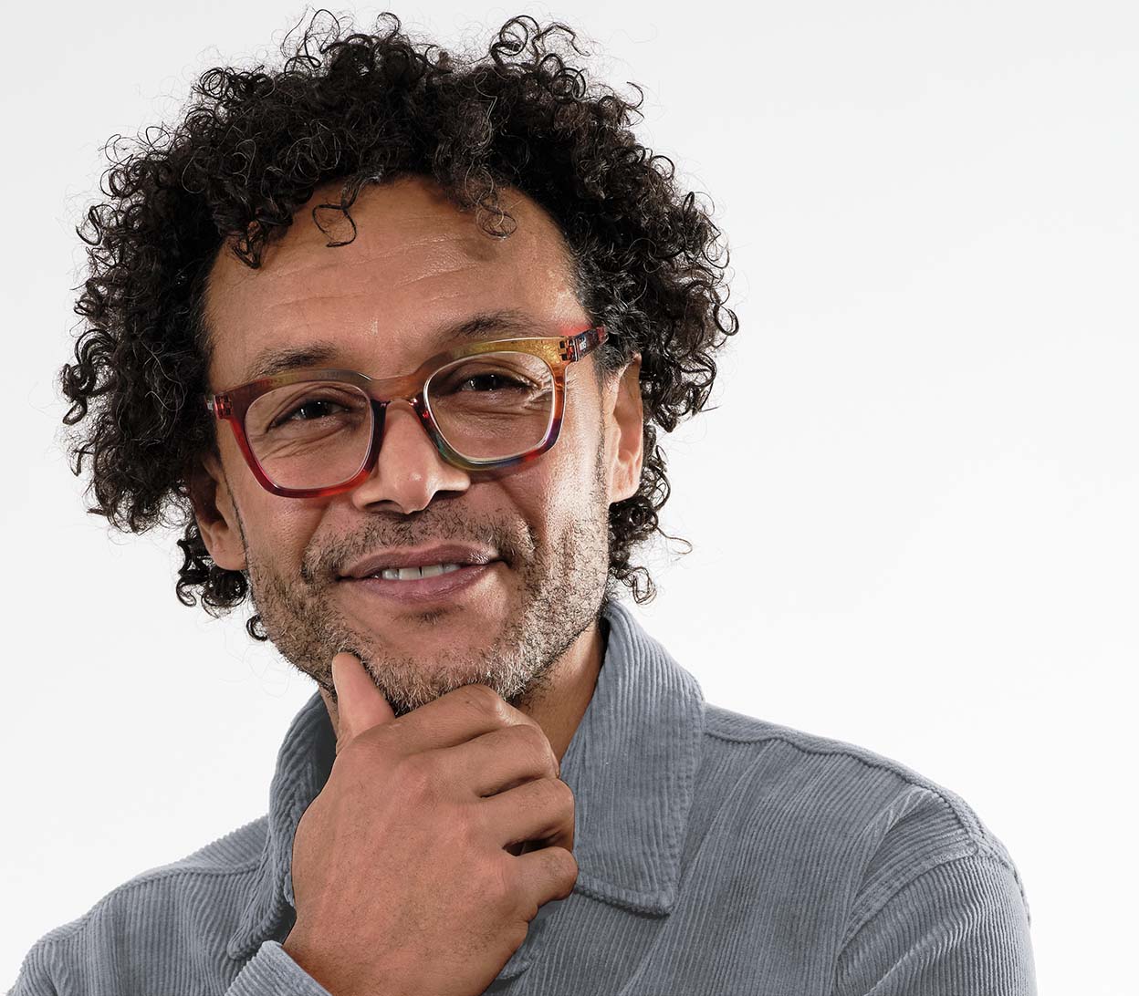 Male model wearing Toast (Multi-coloured) retro and fun reading glasses with large, oversized lenses and slender temples.