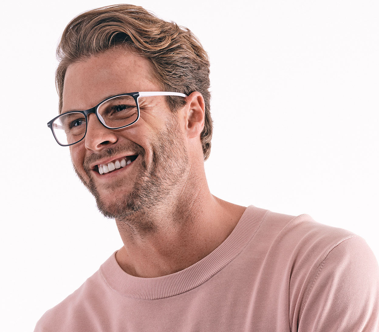 Male model wearing Jazz (White) classic shape reading glasses with rectangular lenses in a two tone black and white frame.