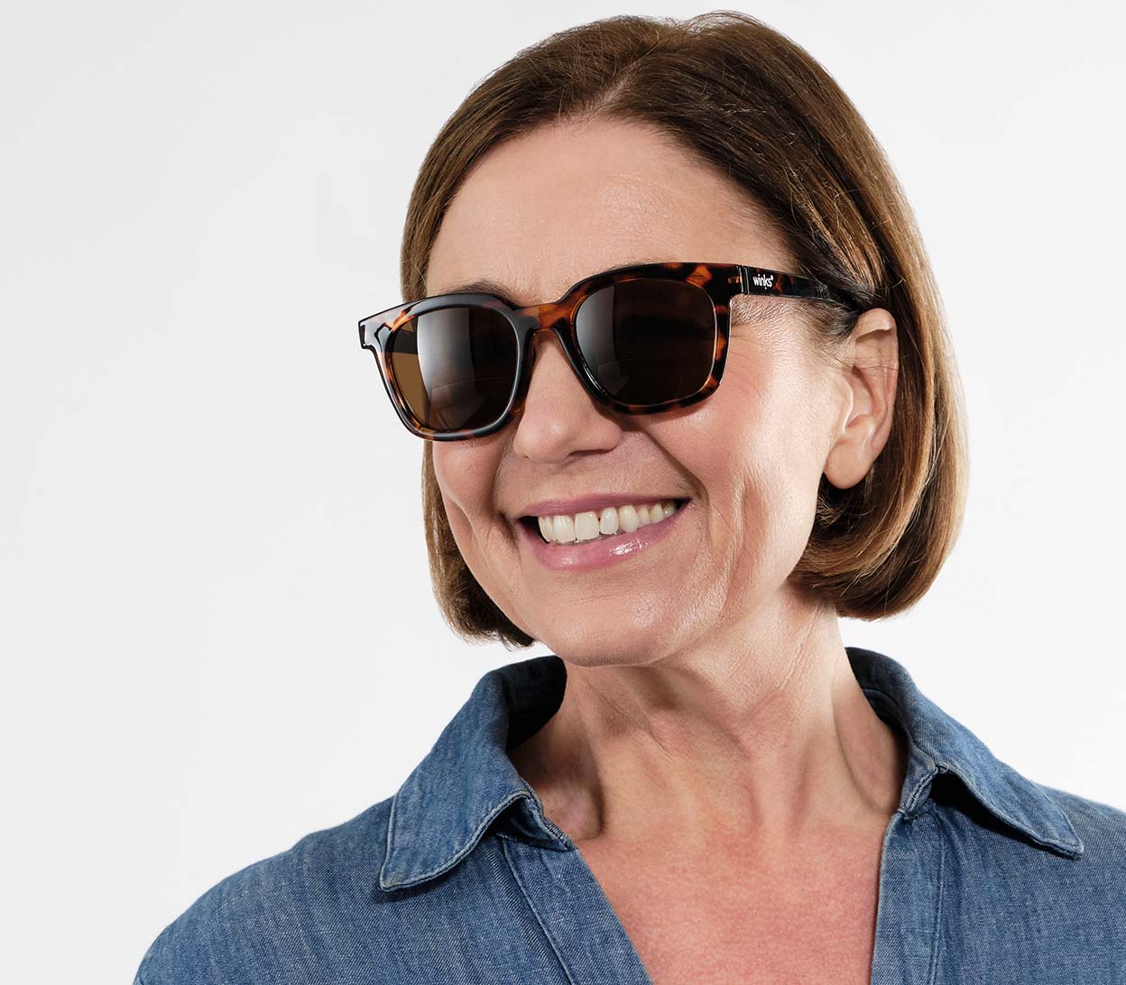 Pisa (Tortoiseshell) large, oversized retro style, bifocal reading sunglasses. Deep tortoiseshell frame and tinted brown lenses. Side view.