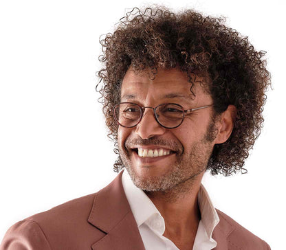 Male model wearing Windsor (Tortoiseshell) retro style unisex reading glasses with a round tortoiseshell and metal frame and bridge.