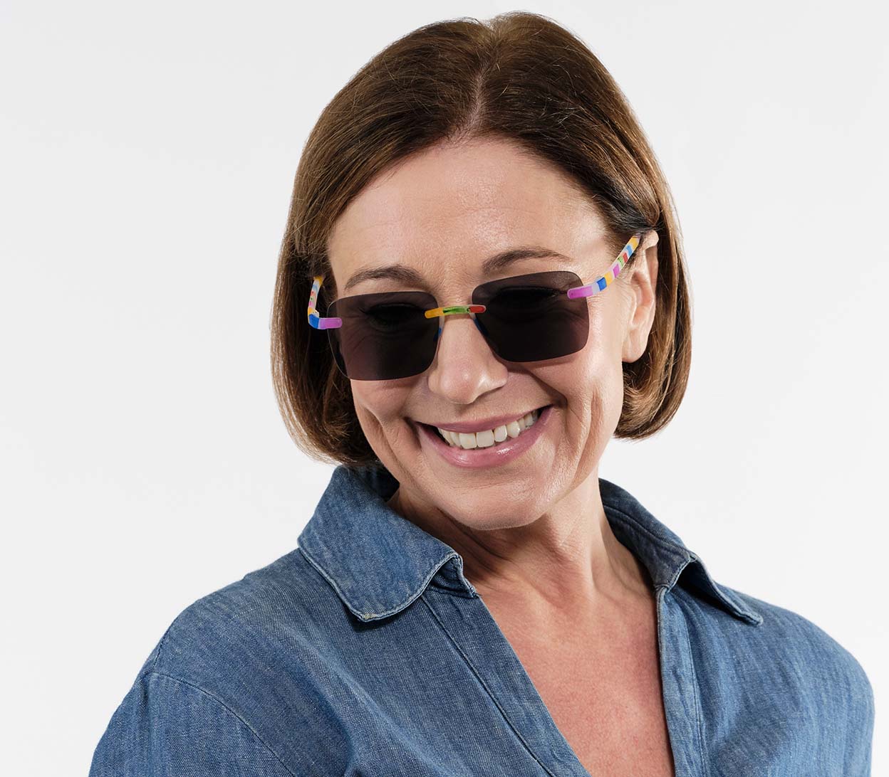 Multicoloured geometric patterned soft glasses case with Jelli branding.